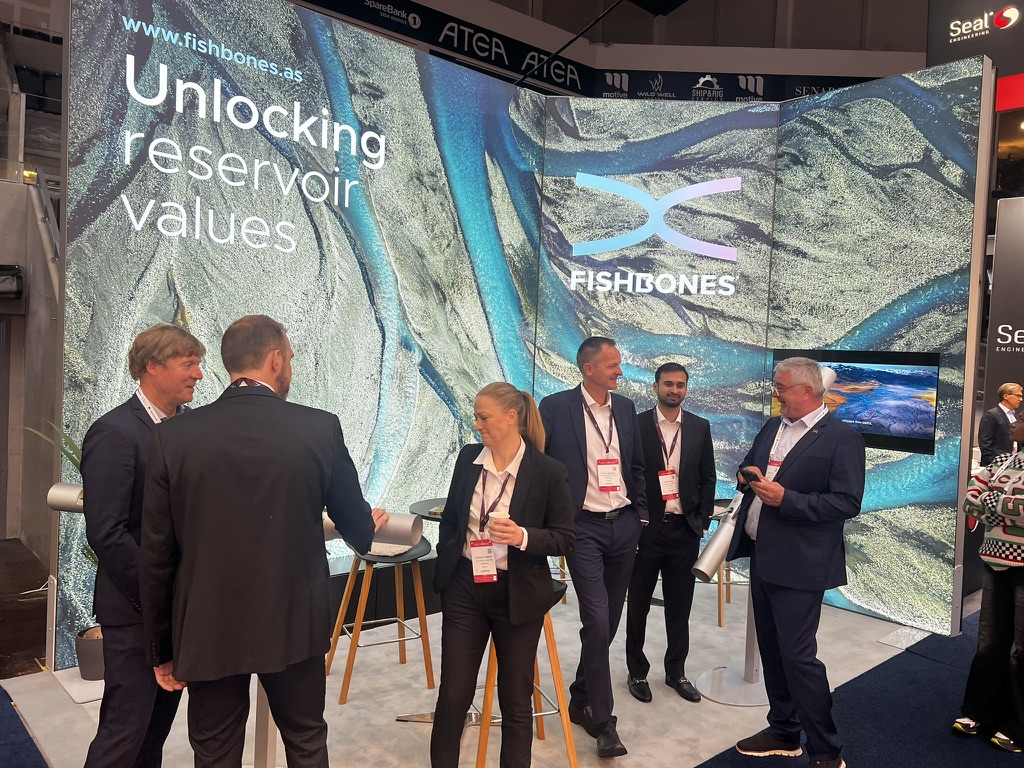 The Saga team with principals at the Fishbones stand, ONS 2026